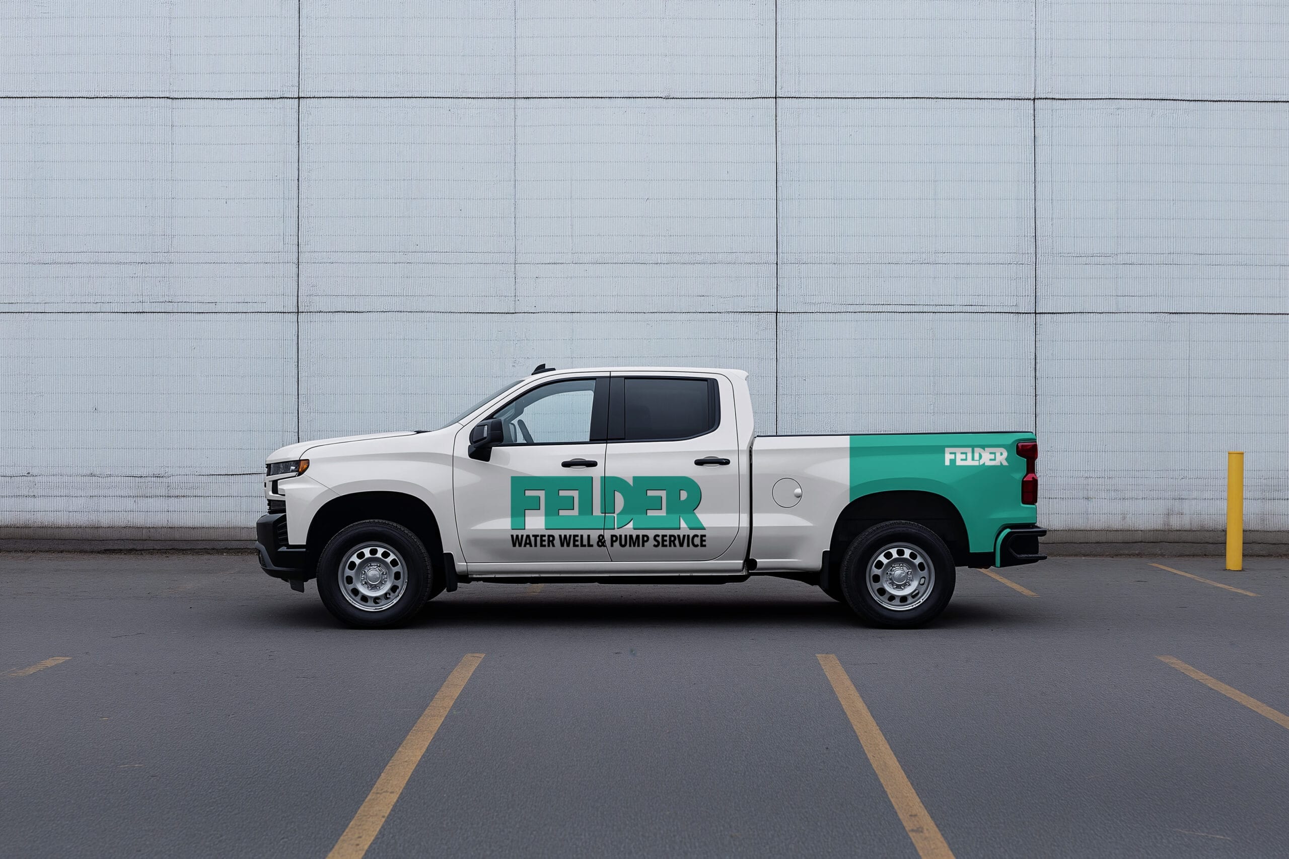 A white and green pickup truck with 