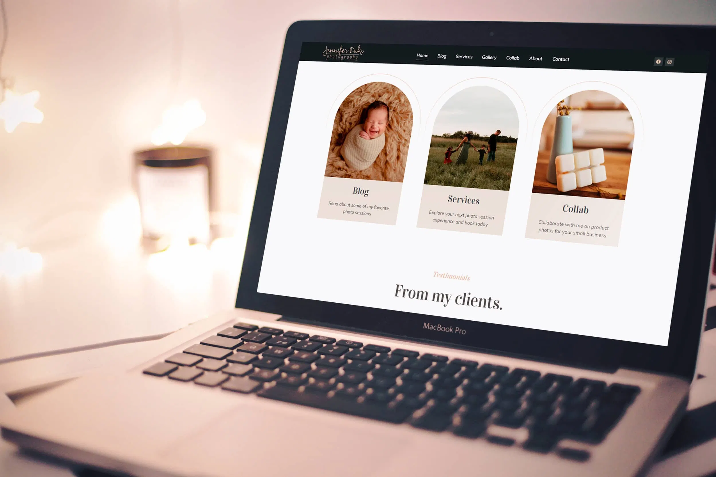 A MacBook Pro on a desk displays a webpage featuring three sections: 
